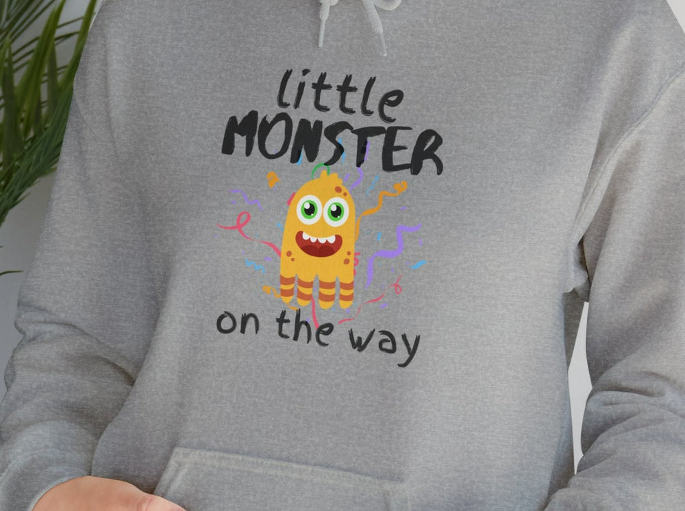 Little (Yellow) Monster On The Way Unisex Heavy Blend™ Hooded Sweatshirt.